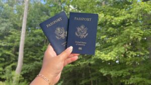 Hand holding two American passports