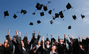Students throwing graduation caps